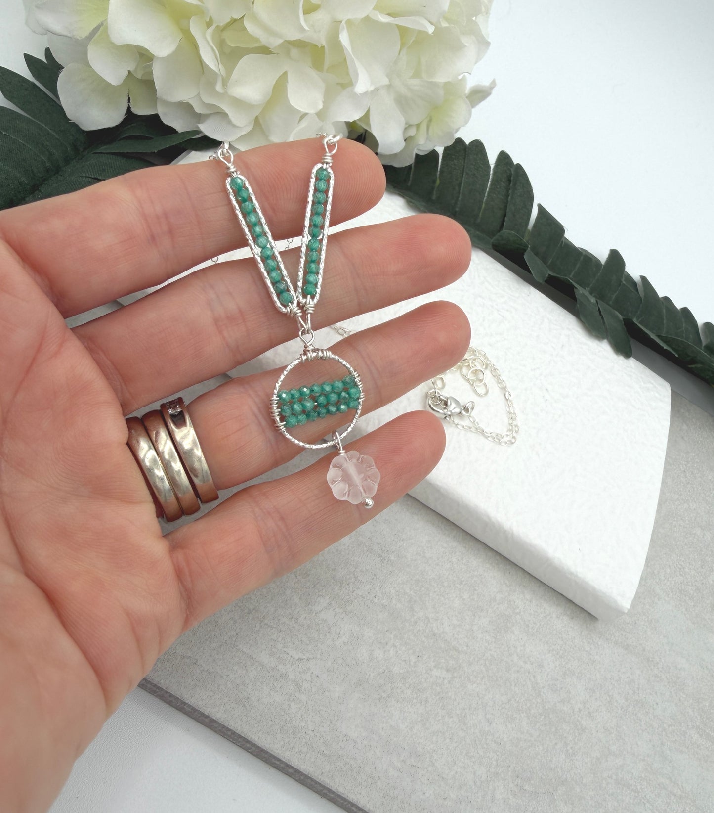 Necklace with Sea Foam Cubic Zirconia, Diamond Cut Loops, and Frosted Glass, Wire Wrapped to a Sterling Silver Cable Chain CDN-938