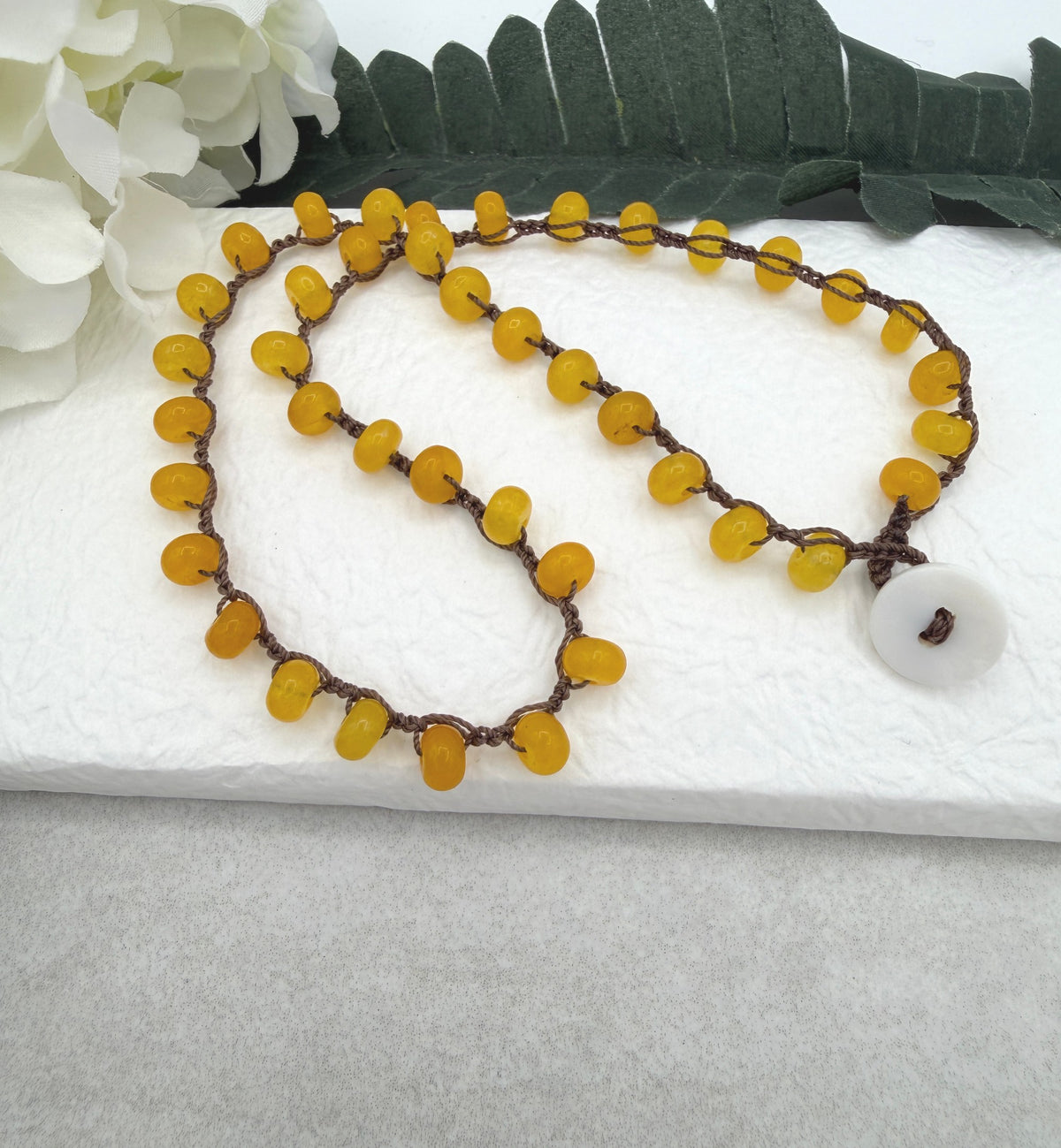 Crocheted Necklace with a Brown Cord and Yellow Jade Rondelles SN-711