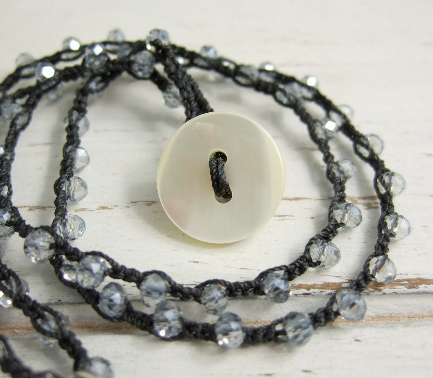 Crocheted Necklace with a Dark Gray Cord, Blue AB Crystal Beads and a Round, PMC Pendant with a Moon and Stars Design SN-427