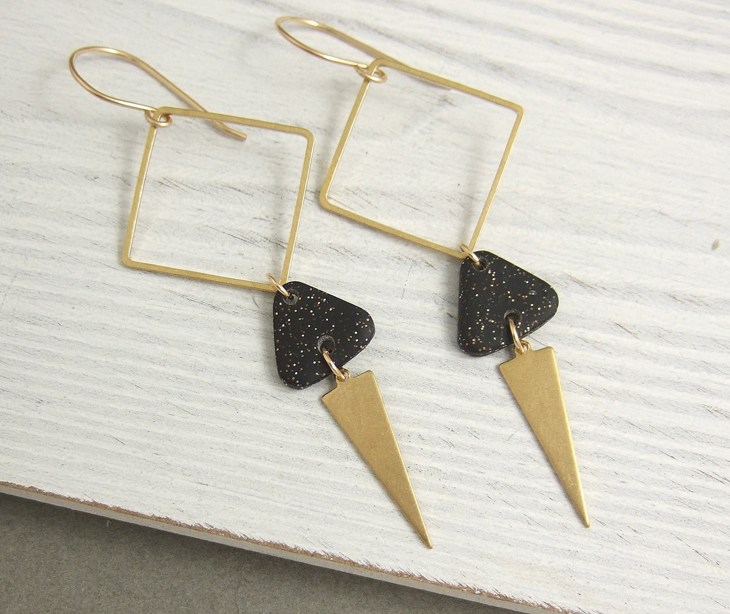 Earrings made with Triangles of Sparkly, Black Polymer Clay, Brass Triangles and Brass Squares on 14k Gold Filled Earring Wires PCE-59