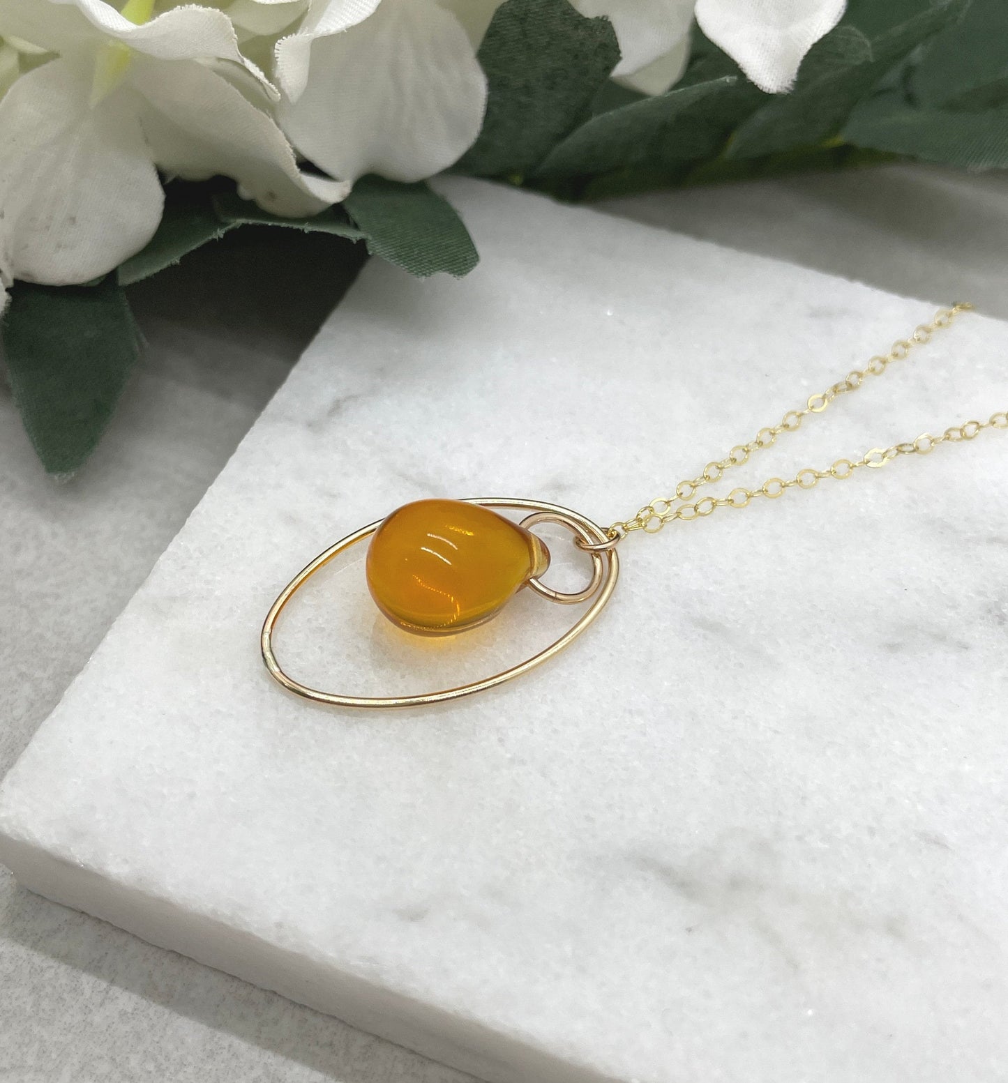Necklace with a Gold Filled Oval Loop and a Honey Colored Glass Teardrop on a 14k Gold-Filled Chain GCDN-160