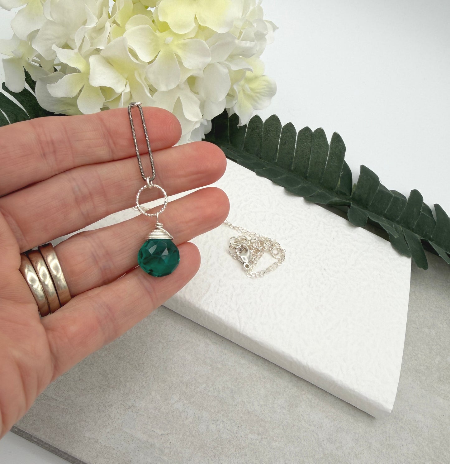 Necklace with a Teal Quartz Teardrop and Diamond Cut Loops, Wire Wrapped to a Sterling Silver Cable Chain CDN-932