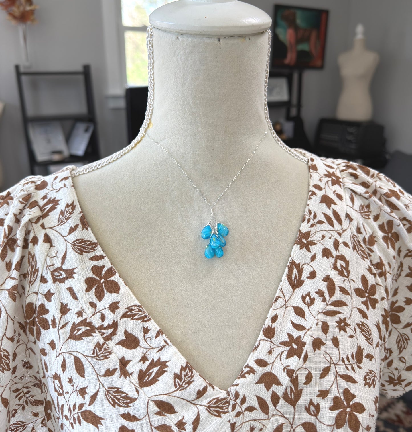 Necklace with a Cascade of Wire Wrapped, Blue and Yellow Glass Teardrops CDN-939