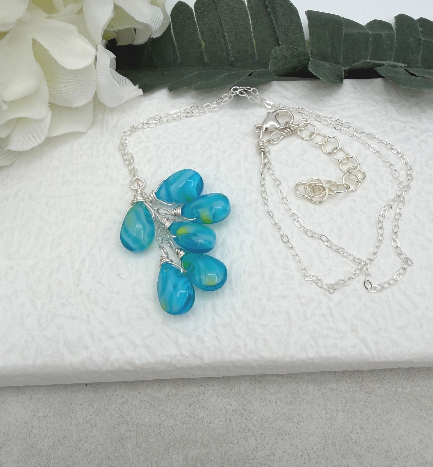 Necklace with a Cascade of Wire Wrapped, Blue and Yellow Glass Teardrops CDN-939