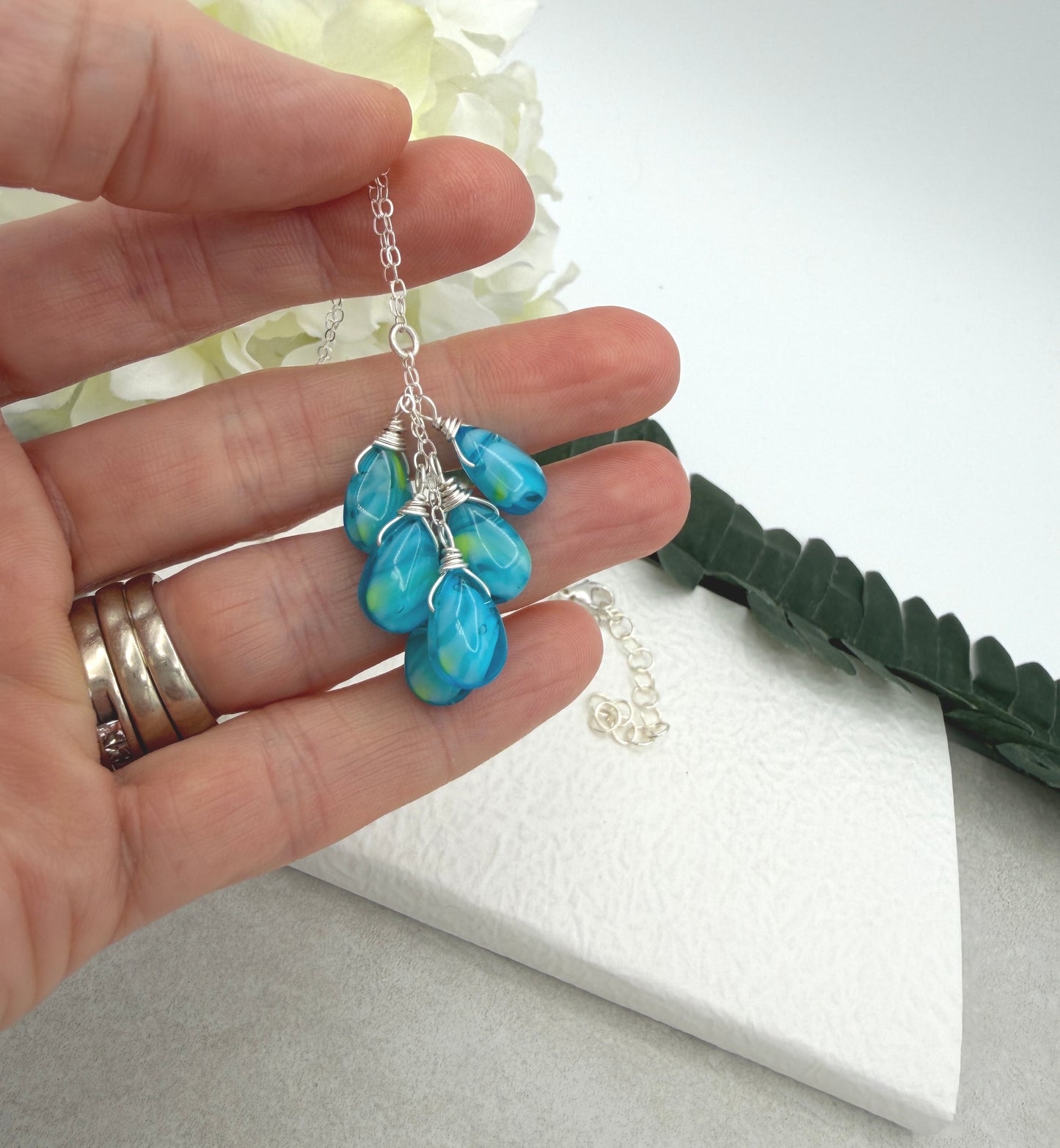 Necklace with a Cascade of Wire Wrapped, Blue and Yellow Glass Teardrops CDN-939