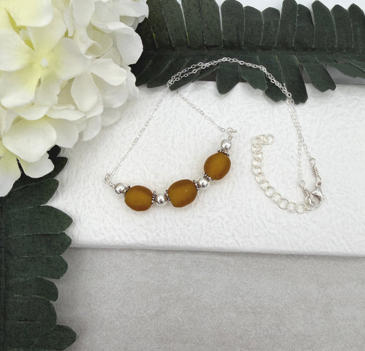 Necklace with a line of Brown, Recycled Frosted Glass and Sterling Silver Beads CDN-943