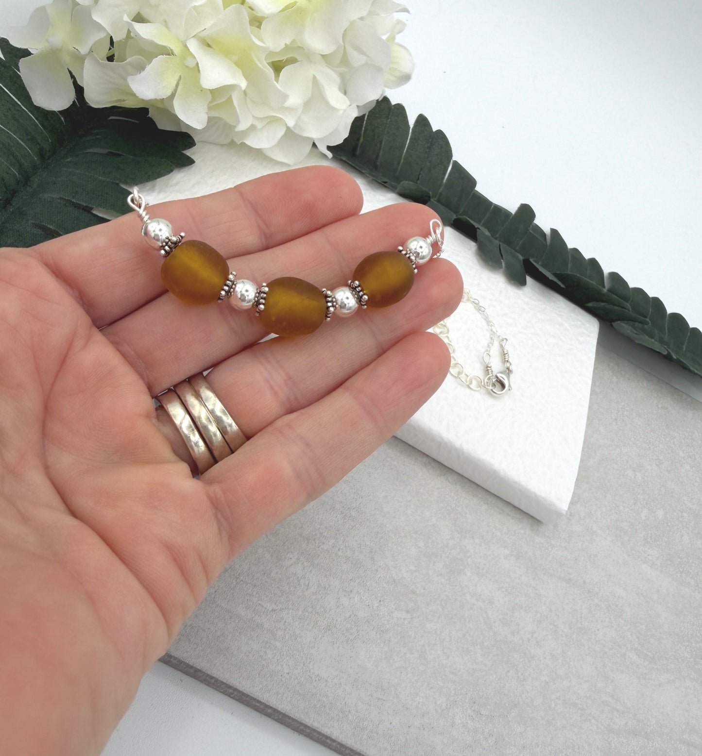 Necklace with a line of Brown, Recycled Frosted Glass and Sterling Silver Beads CDN-943