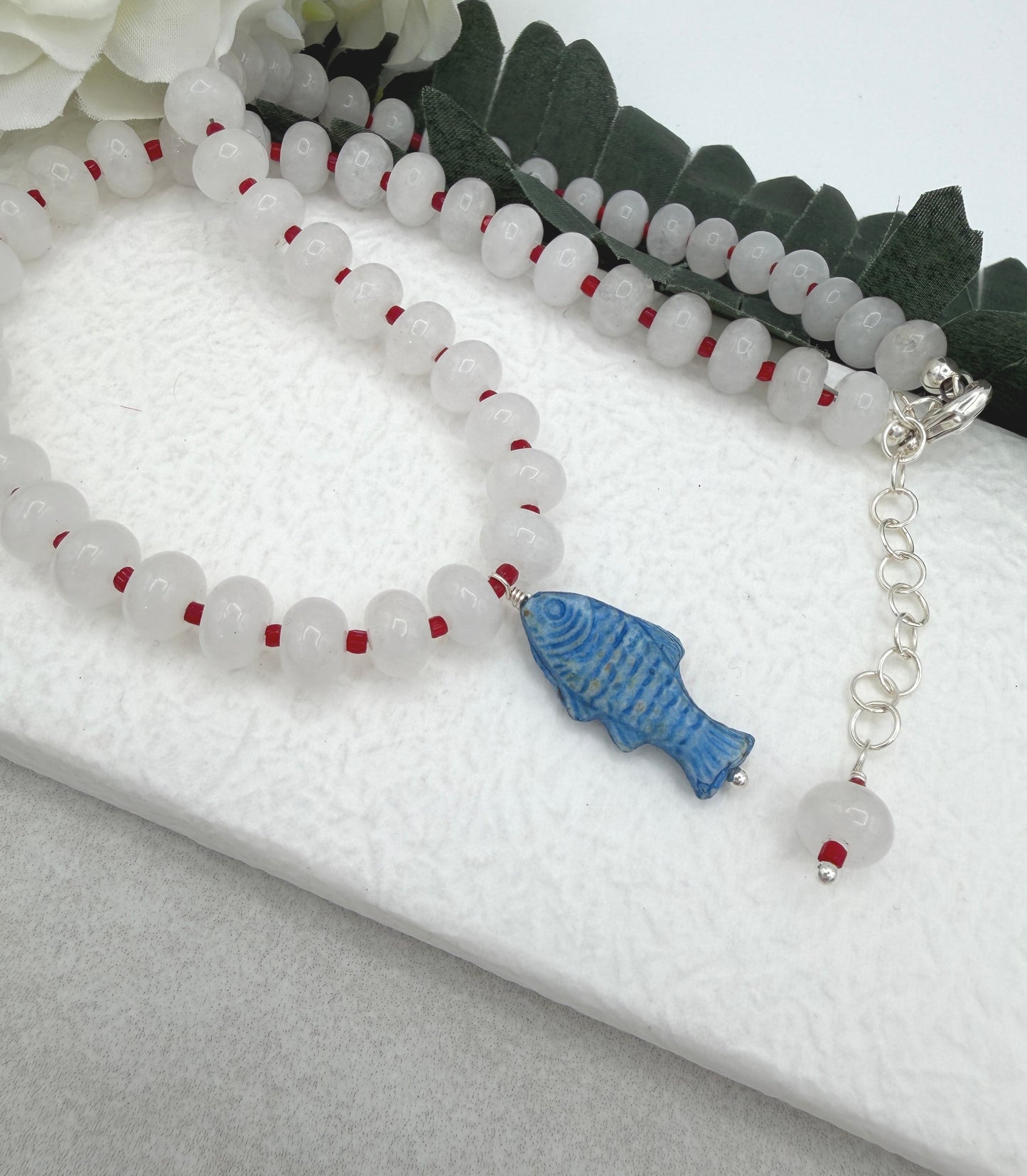 Necklace with White Jade Beads and Red Spacers with a Blue, Czech Glass Fish CDN-959