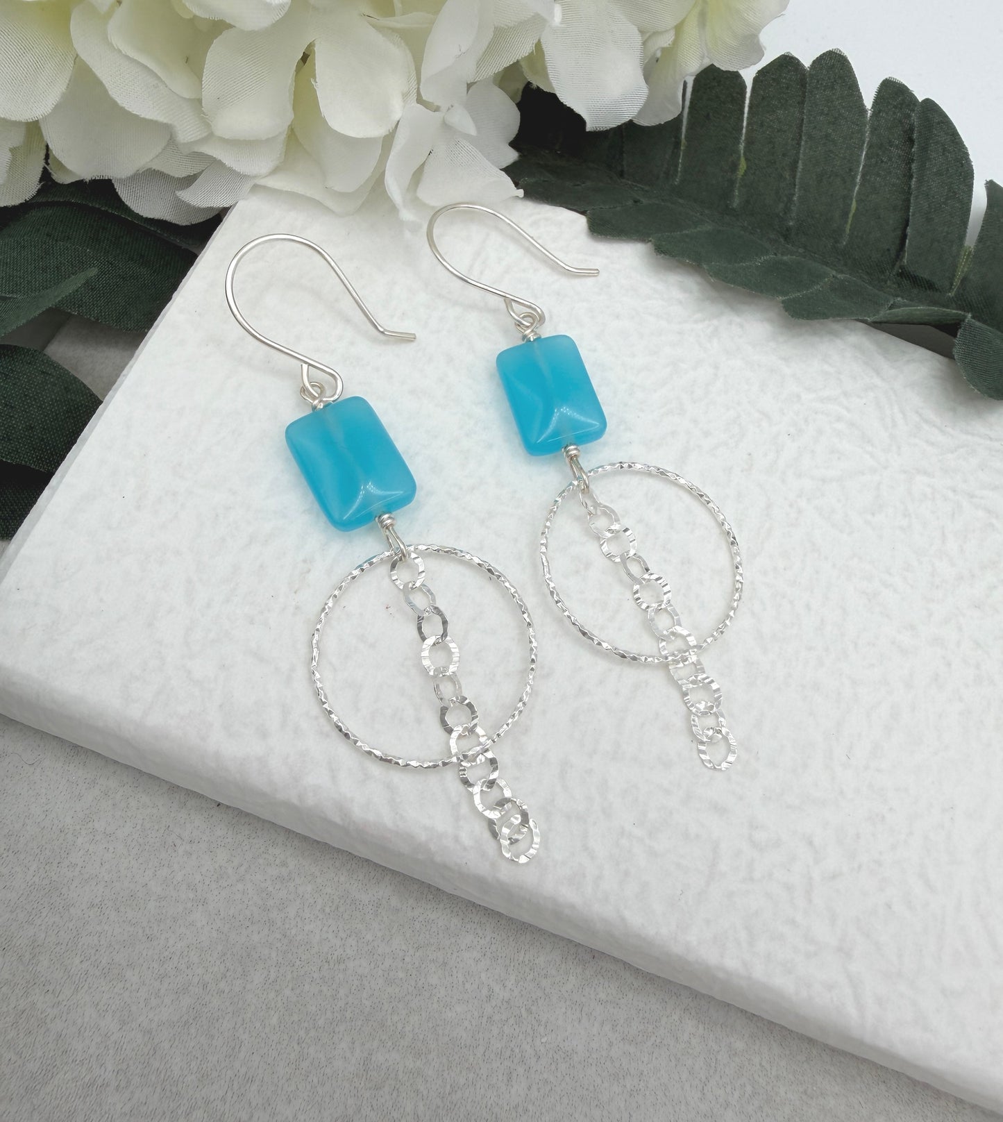 Earrings with Blue Rectangular Beads, Diamond Cut Loops and a Chain Drop CHE-511