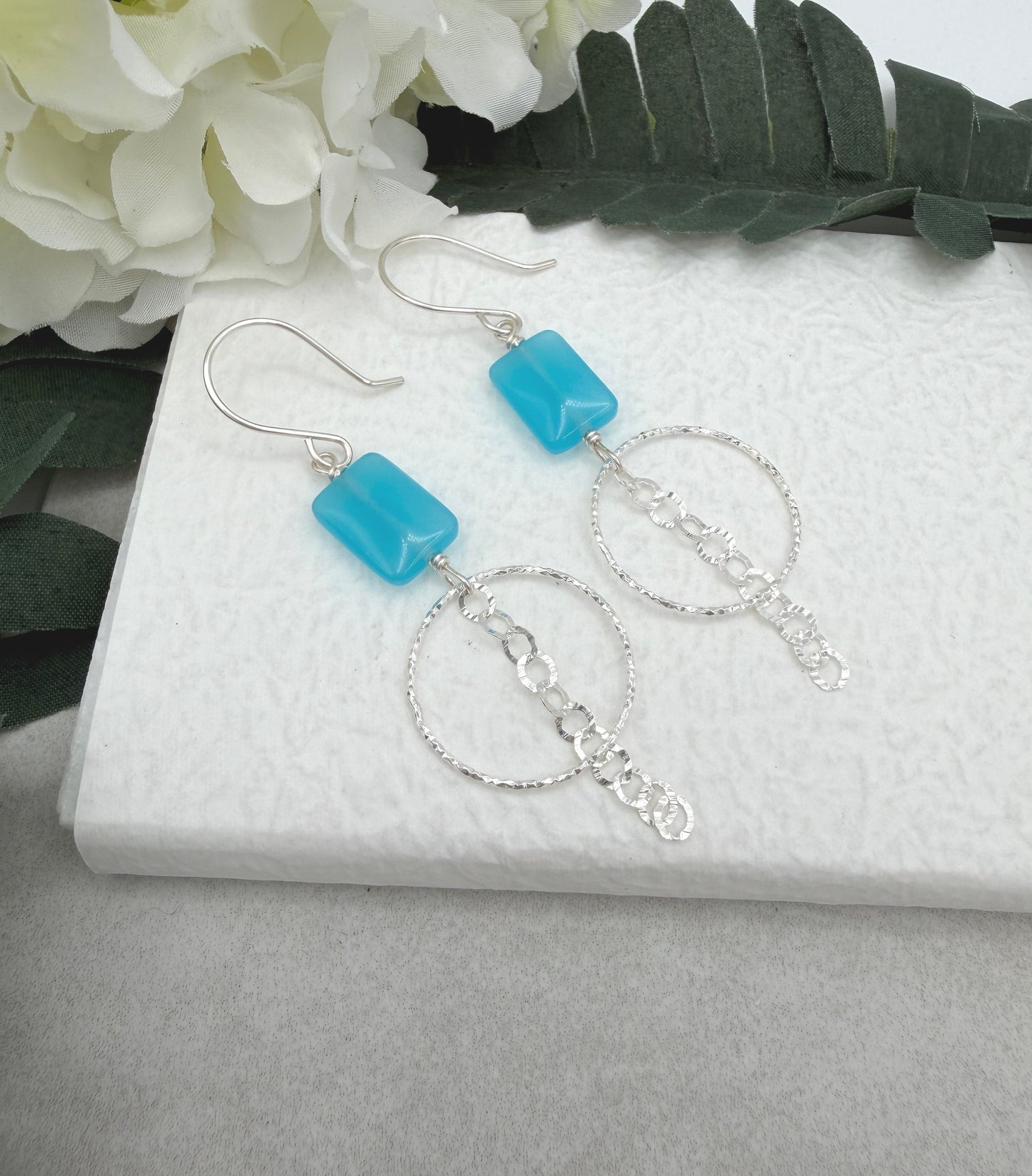 Earrings with Blue Rectangular Beads, Diamond Cut Loops and a Chain Drop CHE-511