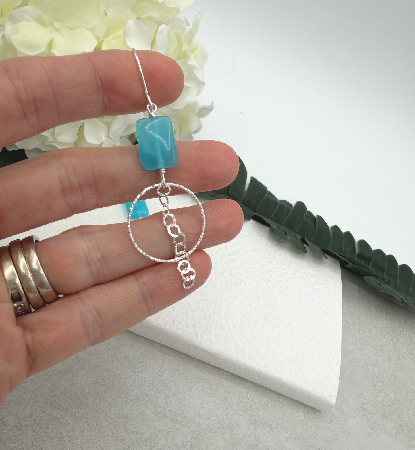 Earrings with Blue Rectangular Beads, Diamond Cut Loops and a Chain Drop CHE-511