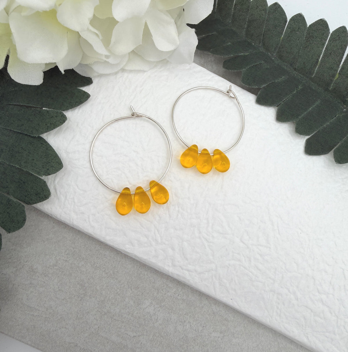 Hoop Earrings with Yellow Glass Teardrop Beads CHE-536