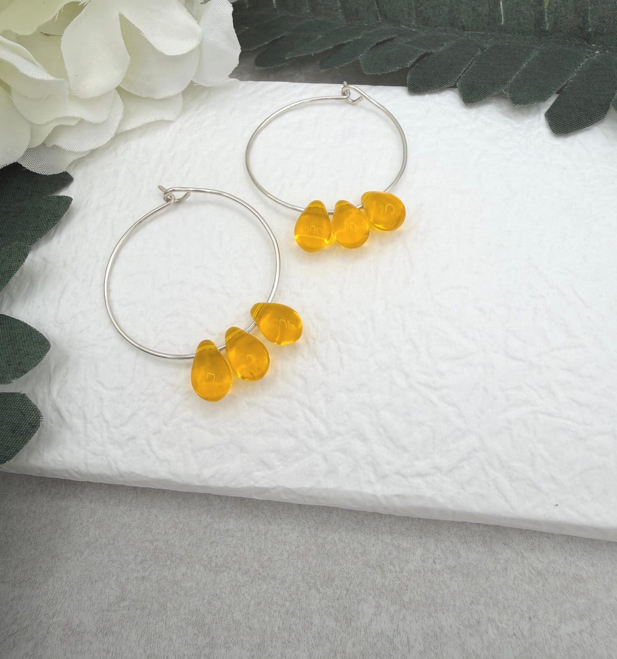 Hoop Earrings with Yellow Glass Teardrop Beads CHE-536