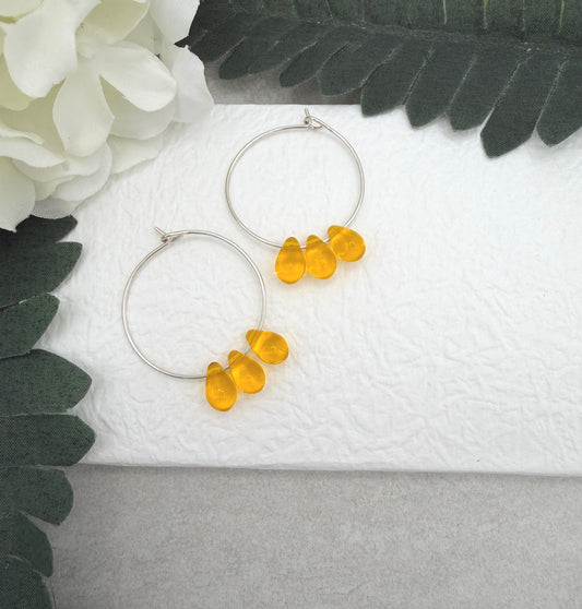 Hoop Earrings with Yellow Glass Teardrop Beads CHE-536