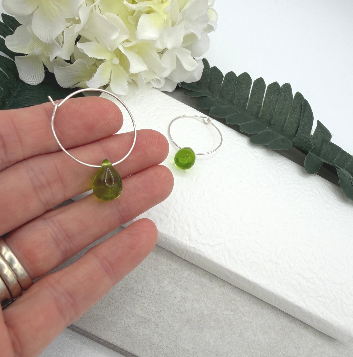 Hoop Earrings with Green Glass Teardrop Beads CHE-537