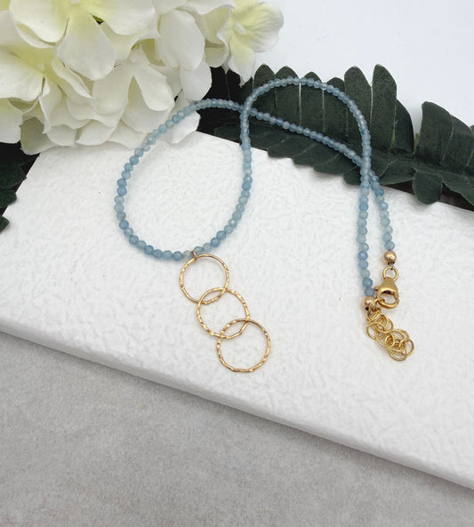 Necklace with Tiny, Aquamarine Beads and a Gold Filled Textured Loop Drop GCDN-205