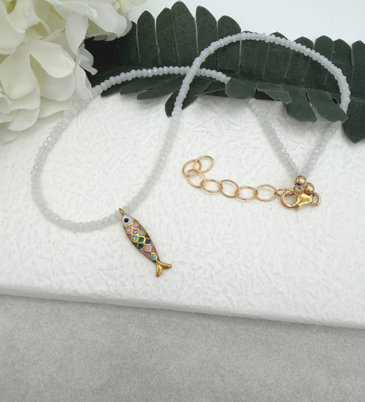 Necklace with Tiny, White Crystal Beads and a Gold Plated, Rainbow Enamled Fish Charm GCDN-212