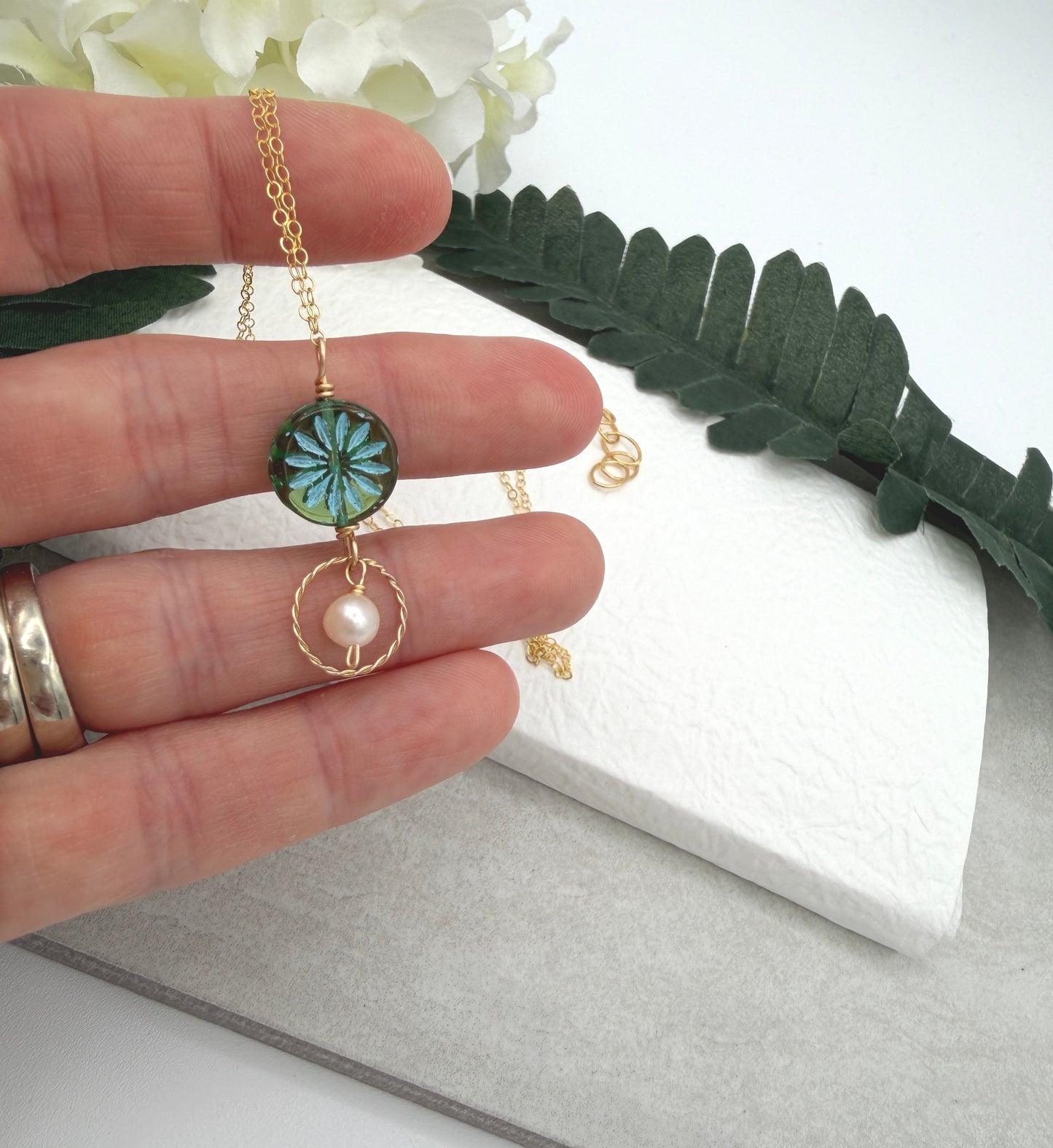 Necklace with a Blue Green Czech Glass Flower Bead, Braided Gold Filled Loop and Pearl GCDN-214