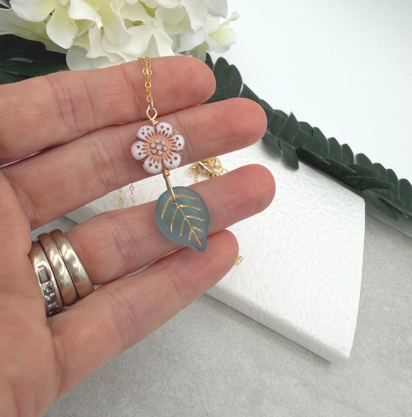 Necklace with a Pink,  Czech Glass Flower and Blue, Czech Glass Leaf GCDN-219