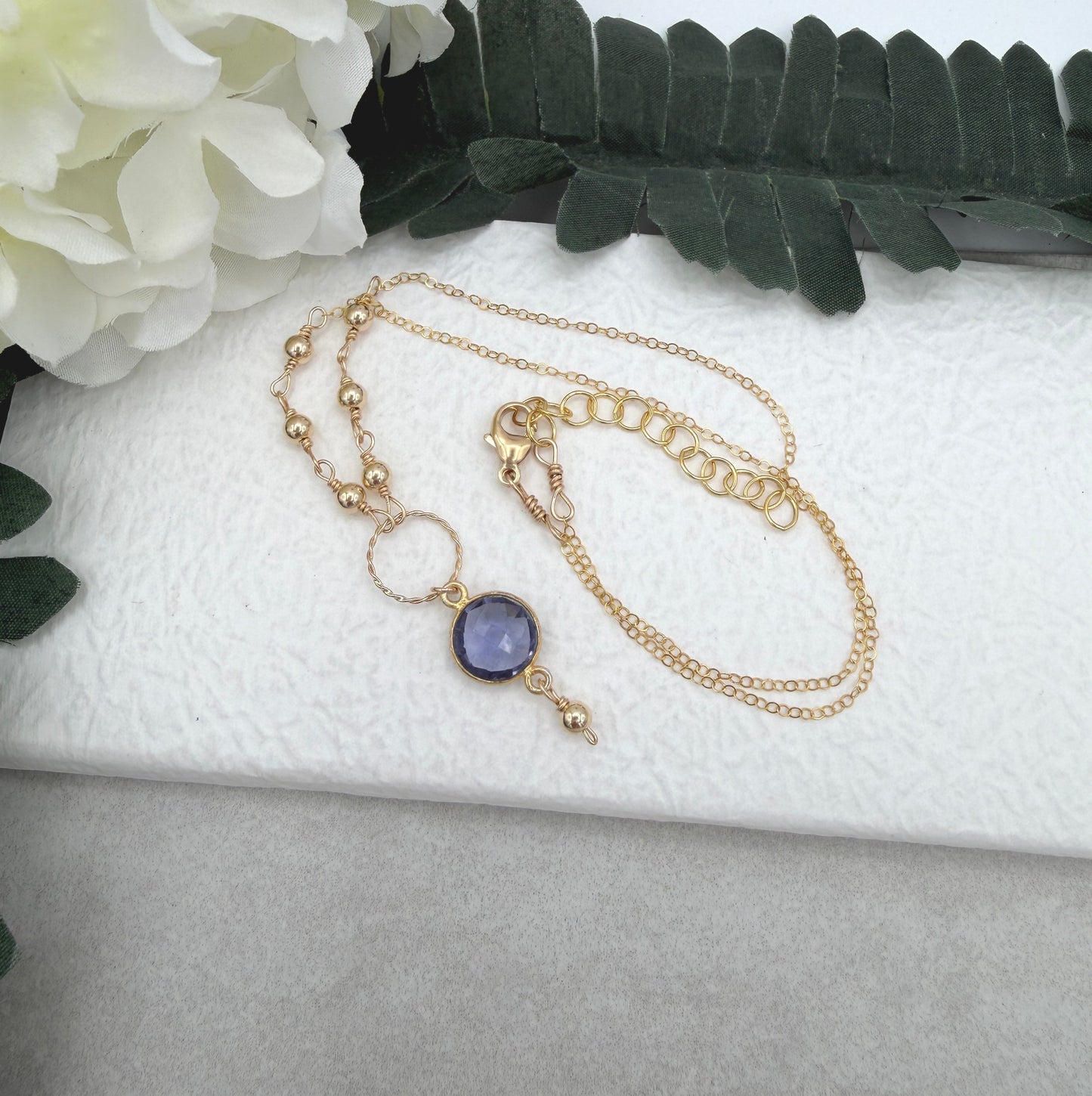Necklace with a Gold Filled Braided Loop, Gold Filled Beads and Bezel Set Iolite GCDN-220