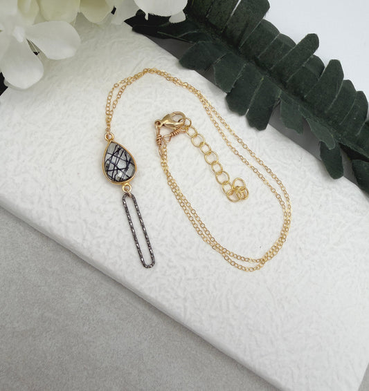 Necklace with a Bezel Set Rutilated Quartz and Oxidized Silver Paperclip Loop GCDN-221