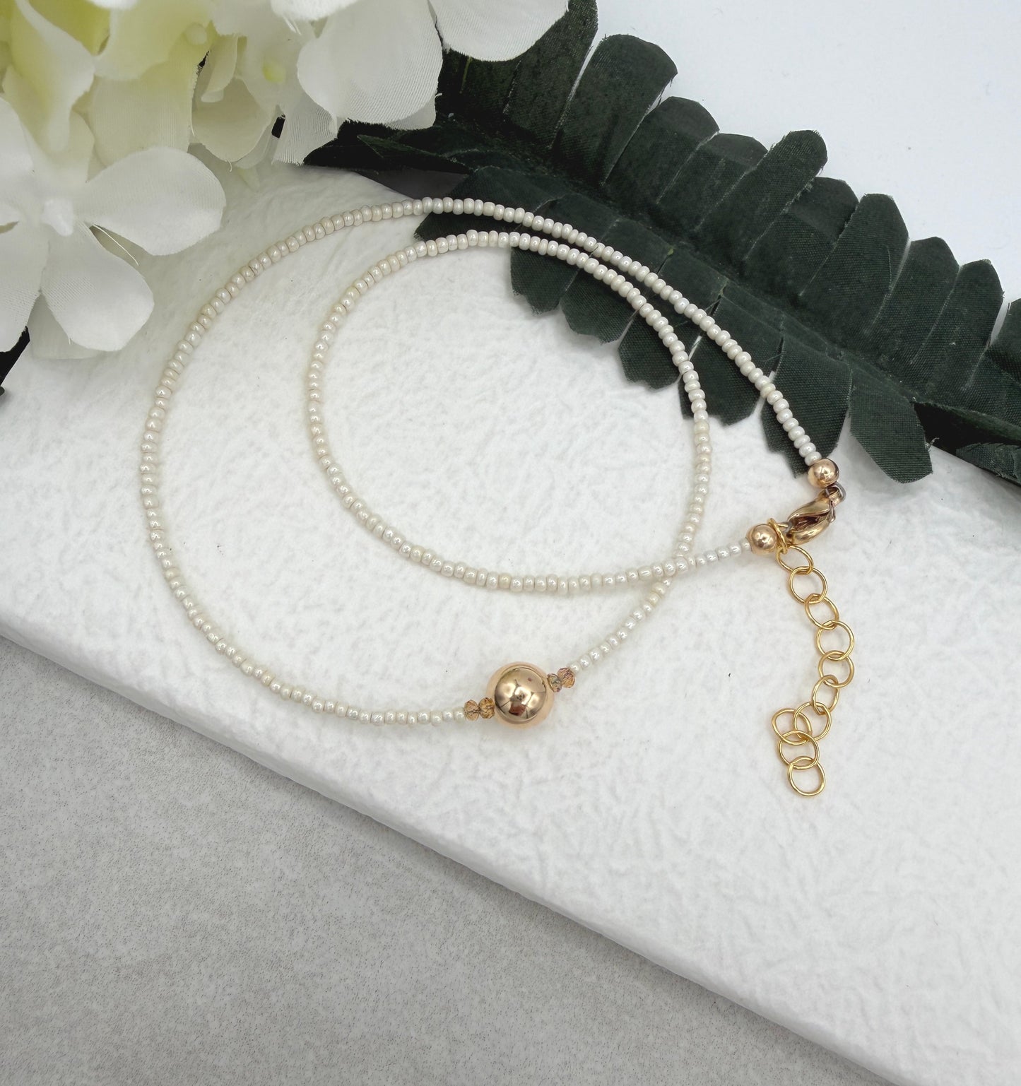 Necklace with Tiny, Pearly Glass Beads, Gold Crystal Beads and a Gold Filled Beadl GCDN-227