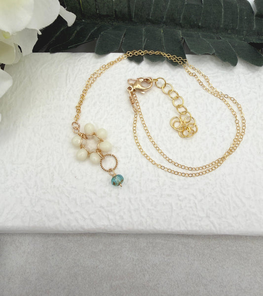 Necklace with Cream Glass Teardrops Wire Wrapped into a Flower with a Braided Loop and Aqua Czech Glass GFP-6