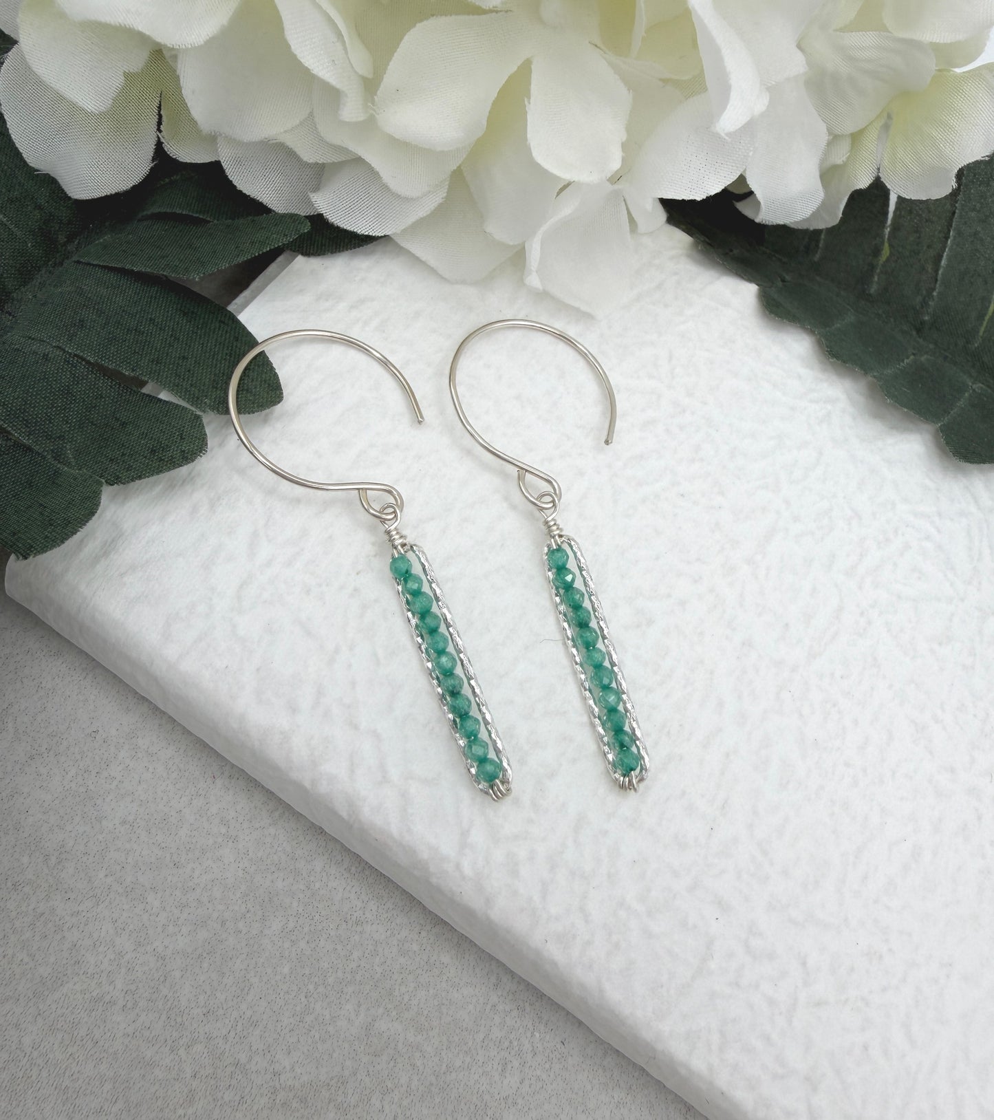 Earrings with Wire Wrapped Sea Foam Cubic Zirconia and Diamond Cut Paperclip Loops HE-556