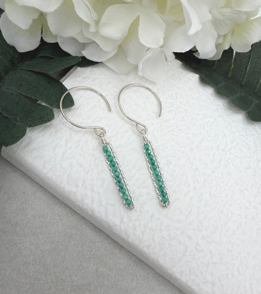 Earrings with Wire Wrapped Sea Foam Cubic Zirconia and Diamond Cut Paperclip Loops HE-556