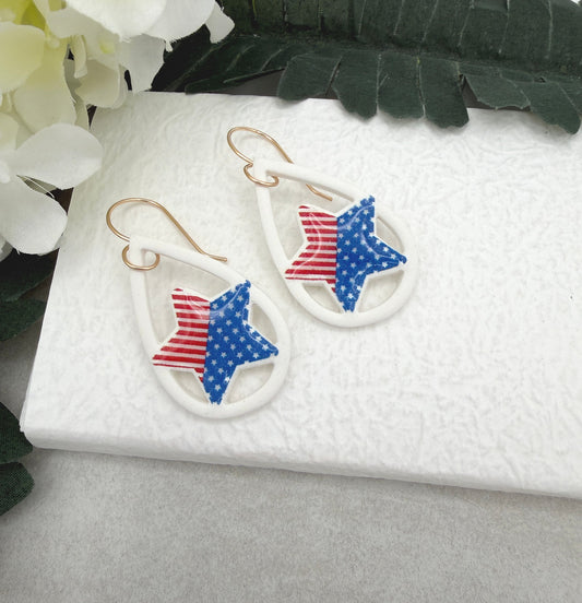 Earrings Made with White Polymer Clay Lined, Teardrop Frames with Stars and Strips Stars PCE-1036