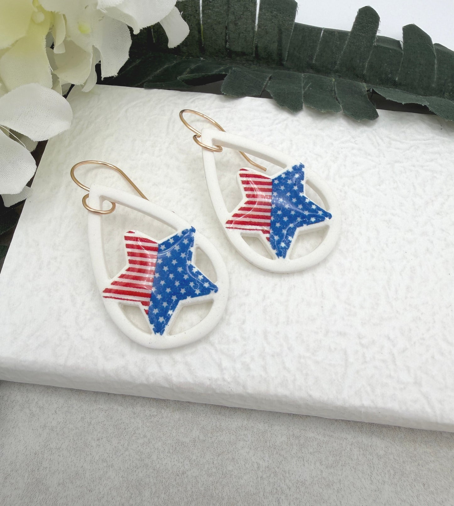 Earrings Made with White Polymer Clay Lined, Teardrop Frames with Stars and Strips Stars PCE-1036