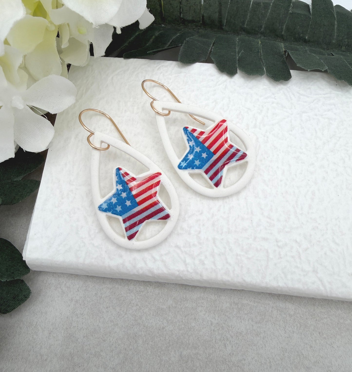 Earrings Made with White Polymer Clay Lined, Teardrop Frames with American Flag Stars PCE-1037