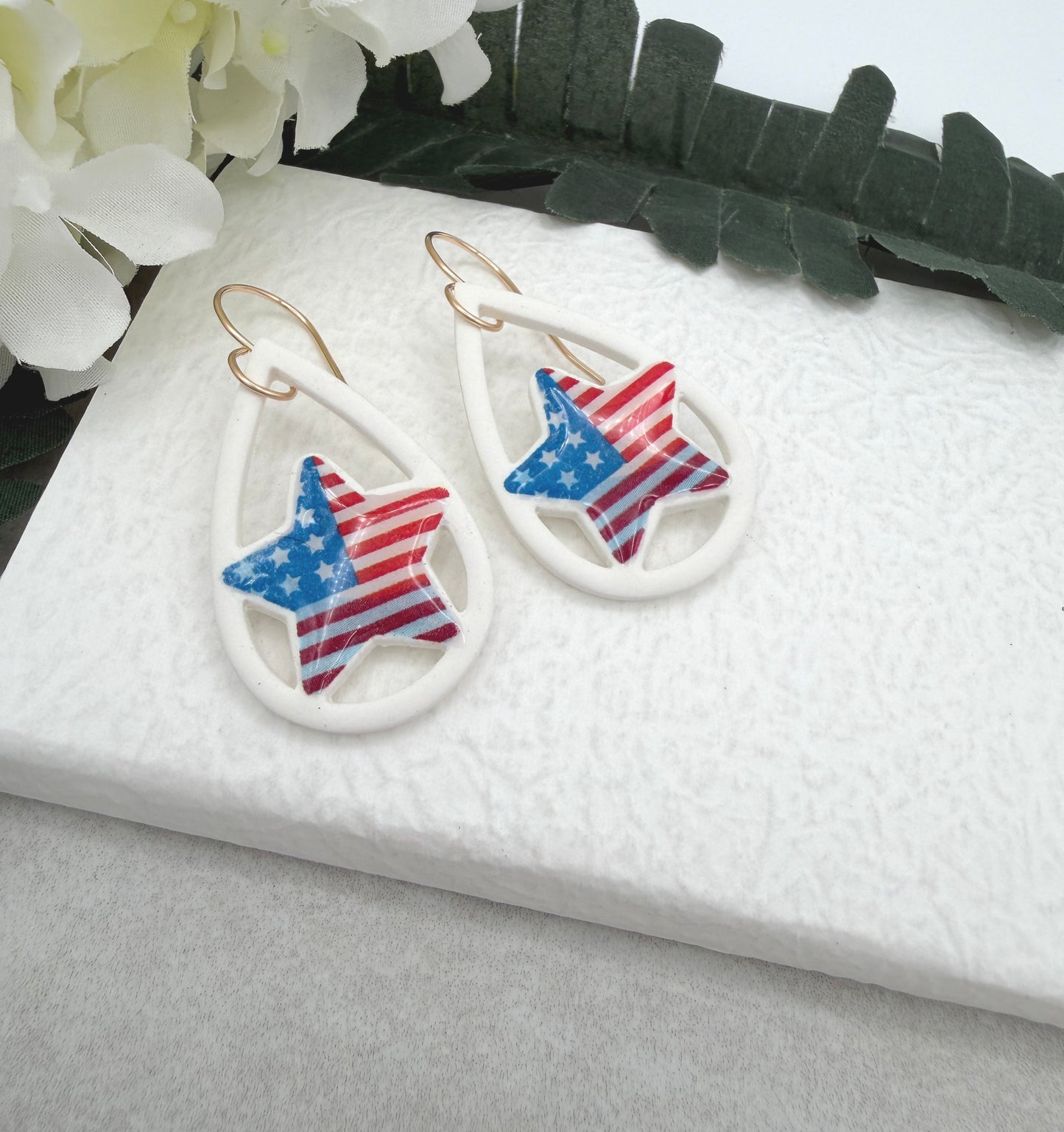Earrings Made with White Polymer Clay Lined, Teardrop Frames with American Flag Stars PCE-1037