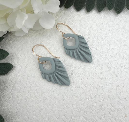 Earrings Made with Blue Polymer Clay Shaped into Lined, Teardrop Frames PCE-1041