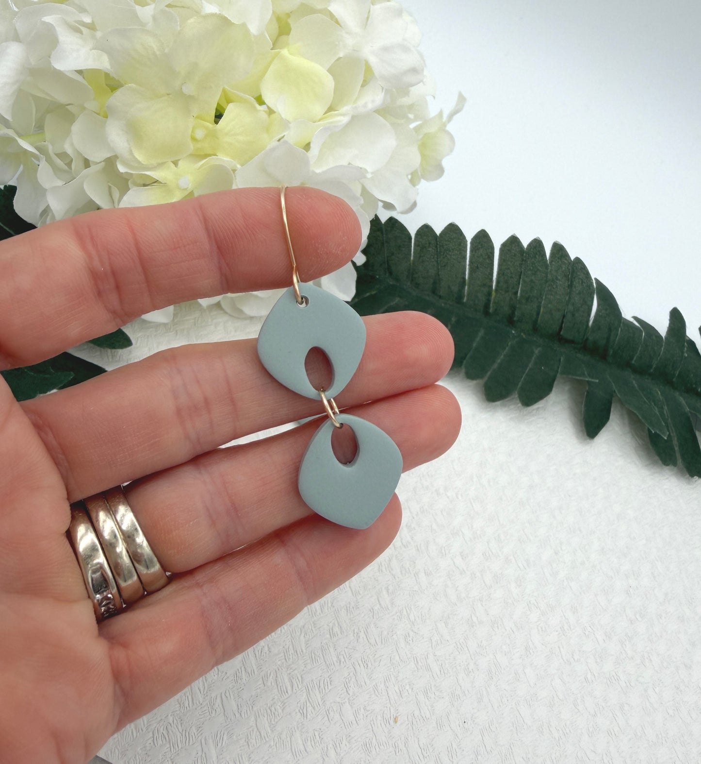 Earrings Made with Blue Polymer Clay Shaped into Two Rounded Teardrops PCE-1042