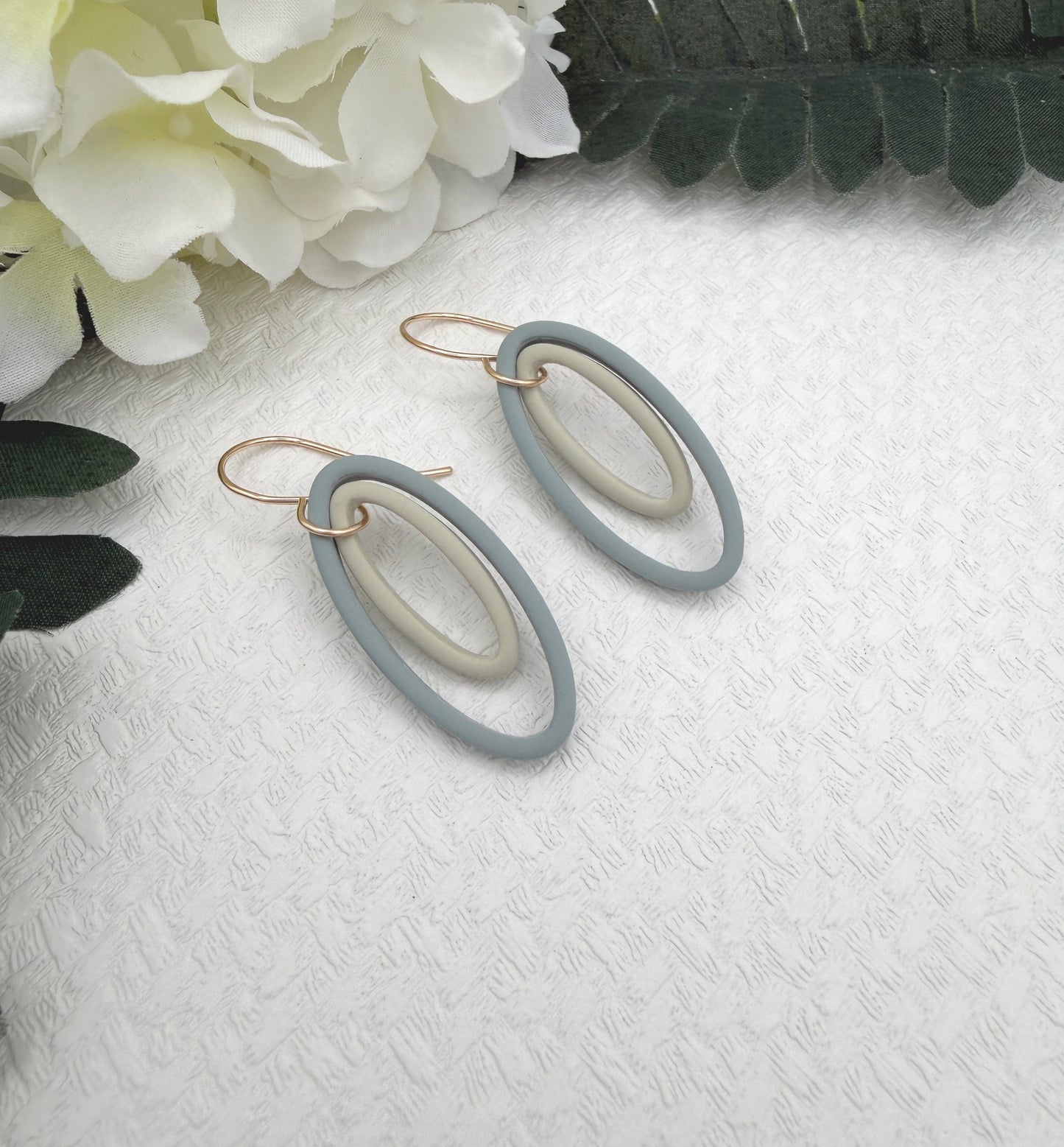 Earrings Made with Blue and Green Polymer Clay Shaped into Oval Frames PCE-1044
