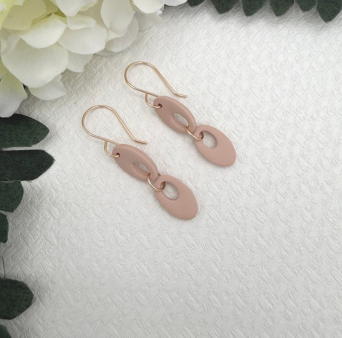 Earrings Made with Dusty Coral Polymer Clay Shaped into Two Rounded Teardrops PCE-1047