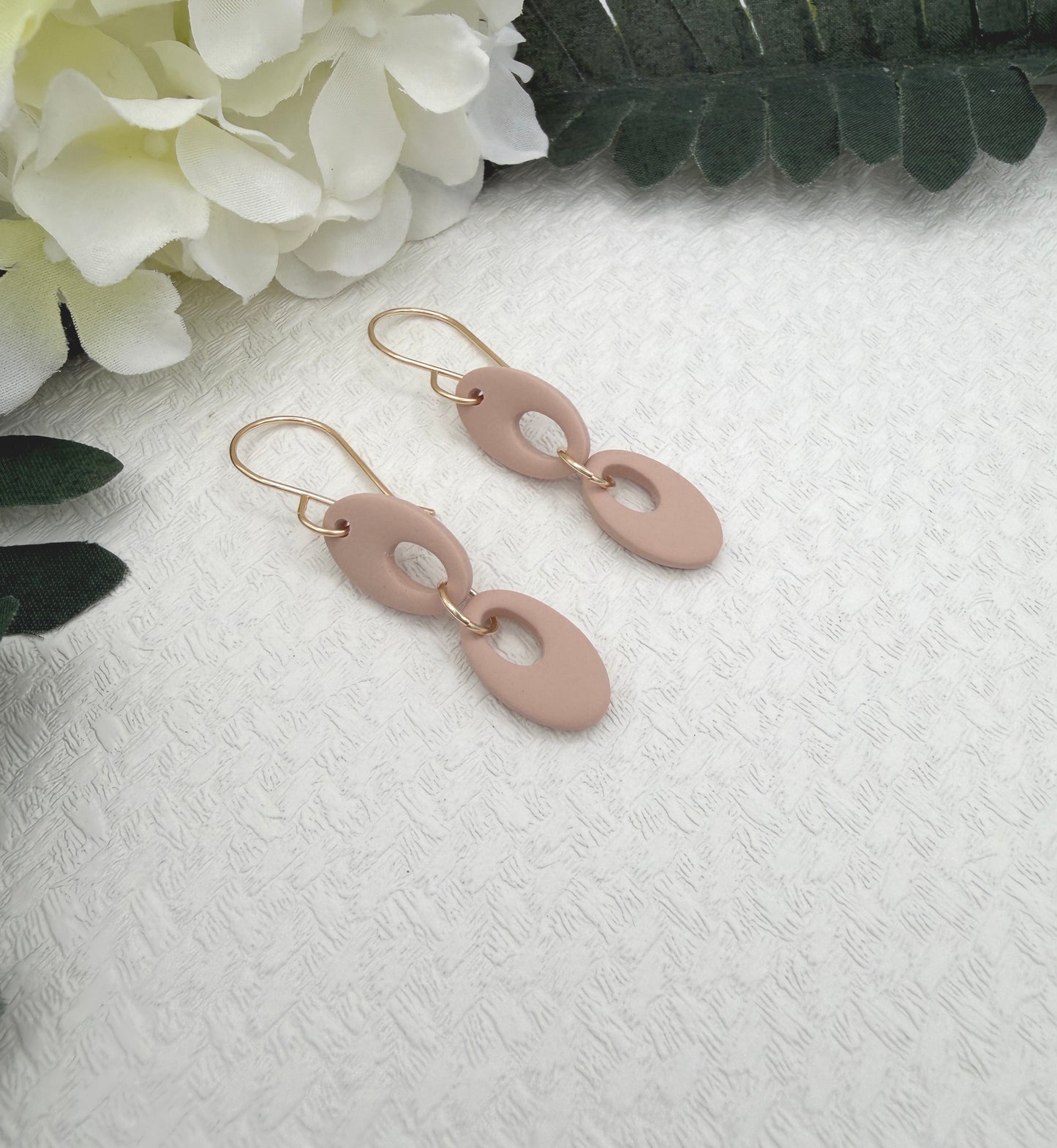 Earrings Made with Dusty Coral Polymer Clay Shaped into Two Rounded Teardrops PCE-1047