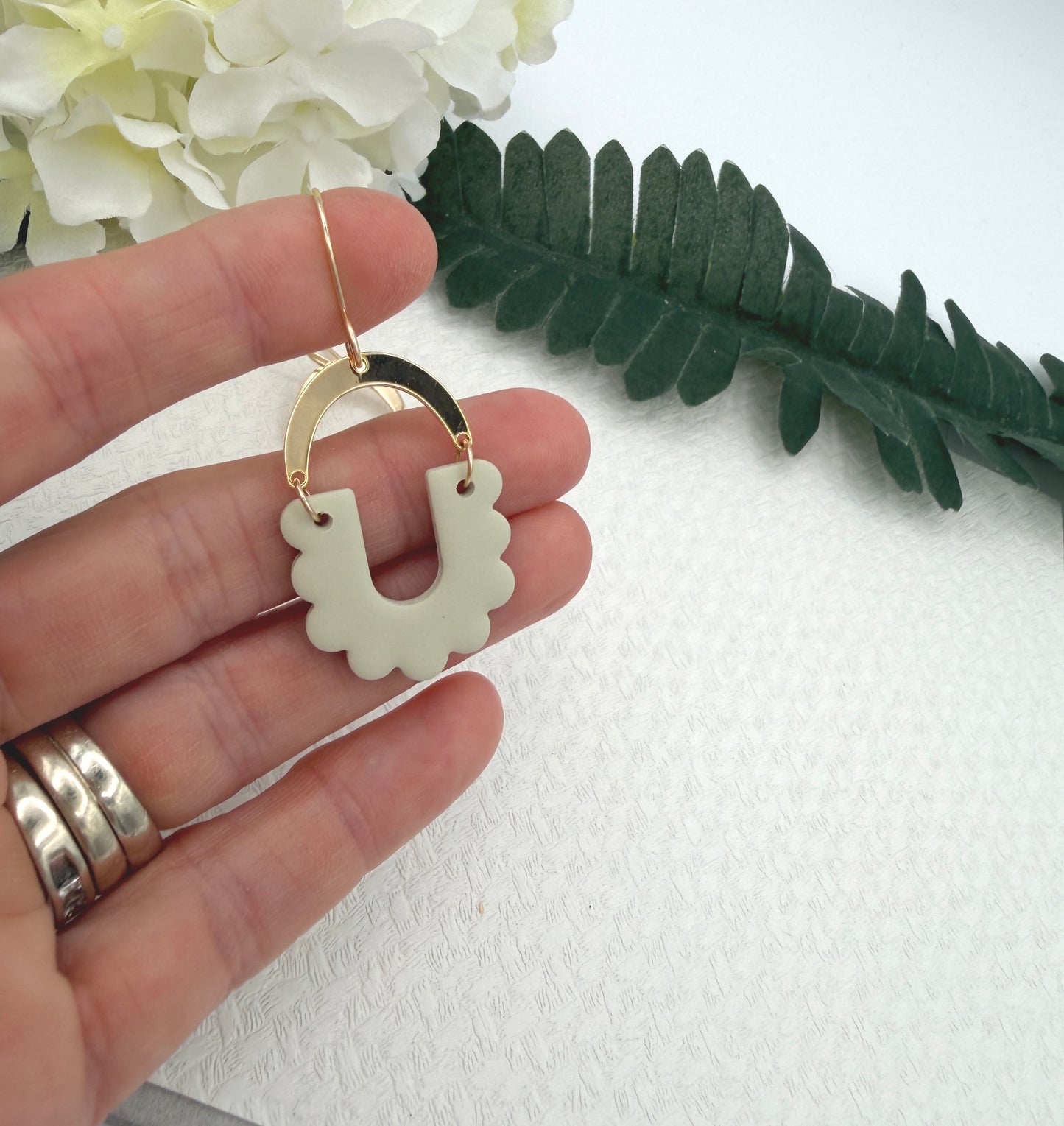 Earrings Made with Seafoam Polymer Clay Shaped into Arches with Petals and Gold Plated Arches PCE-1049