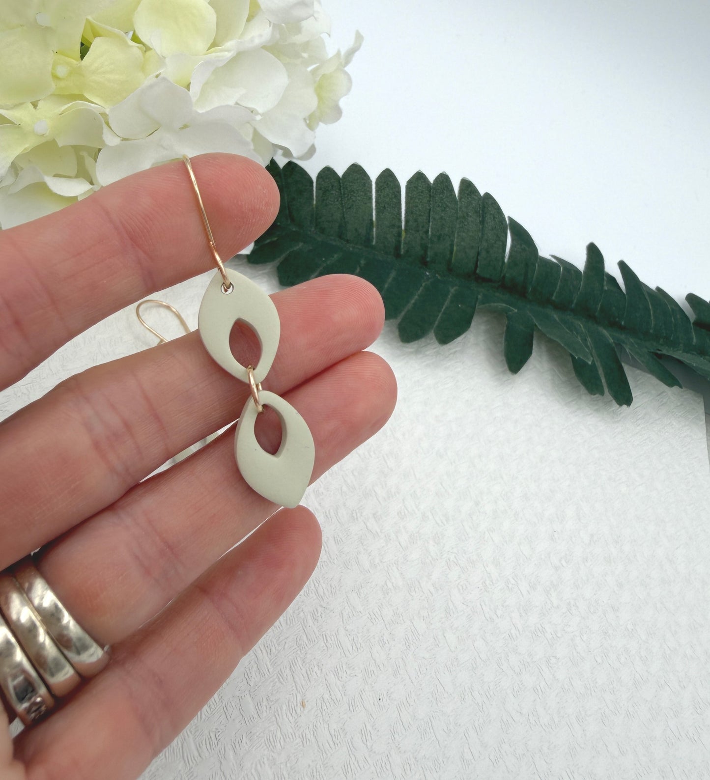 Earrings Made with Seafoam Polymer Clay Shaped into Two Rounded Teardrops PCE-1050