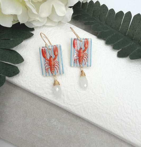 Earrings Made with White Polymer Clay with a Lobster Design and White Crystal Drop PCE-1056
