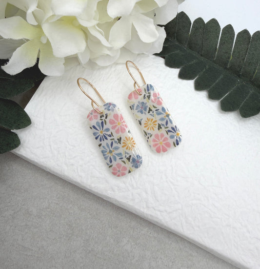 Earrings Made with White Polymer Clay with a PInk, Blue, Yellow Floral Design PCE-1060