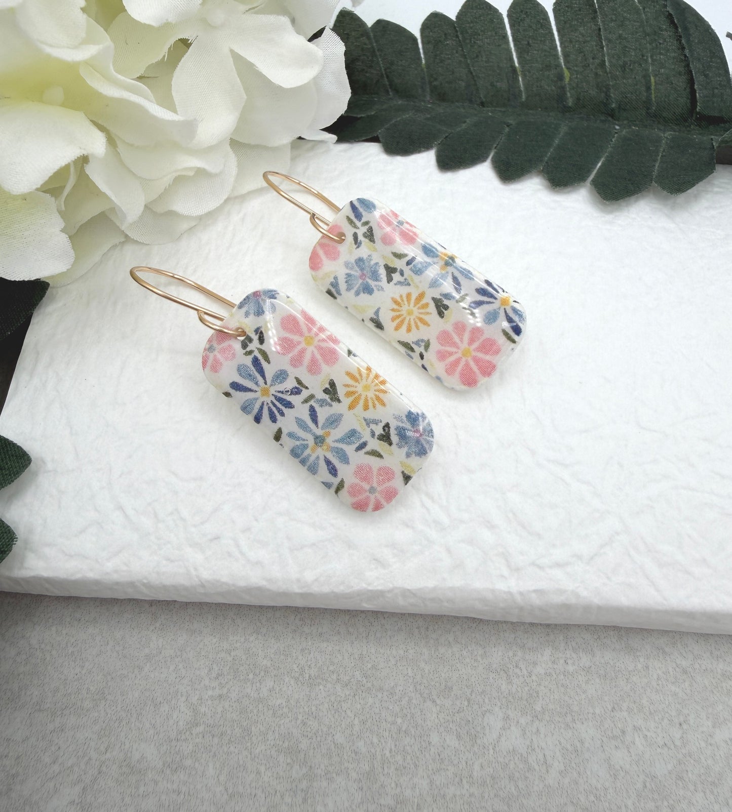 Earrings Made with White Polymer Clay with a PInk, Blue, Yellow Floral Design PCE-1060