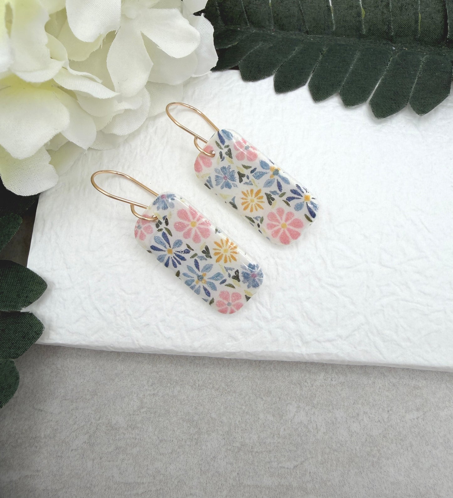 Earrings Made with White Polymer Clay with a PInk, Blue, Yellow Floral Design PCE-1060