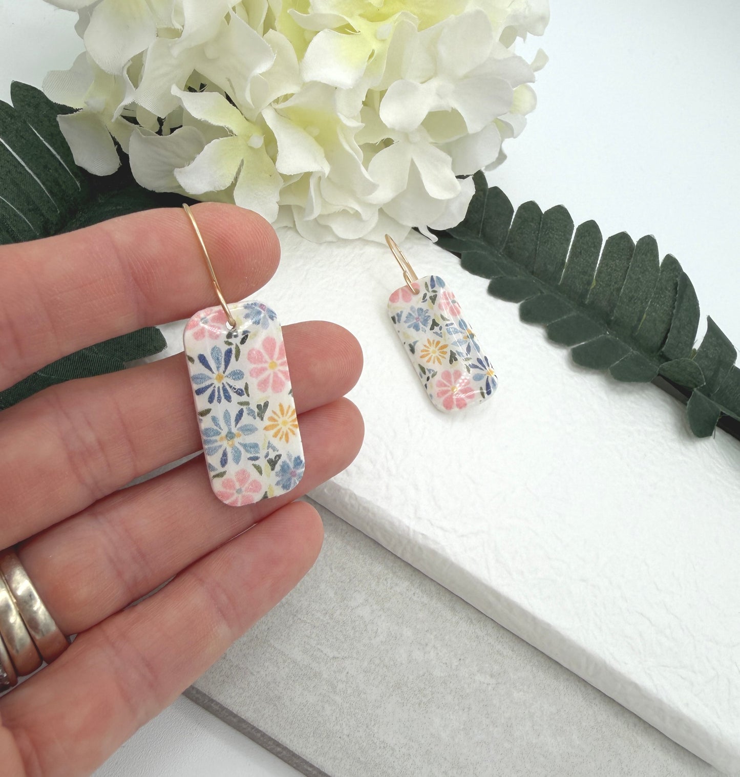 Earrings Made with White Polymer Clay with a PInk, Blue, Yellow Floral Design PCE-1060