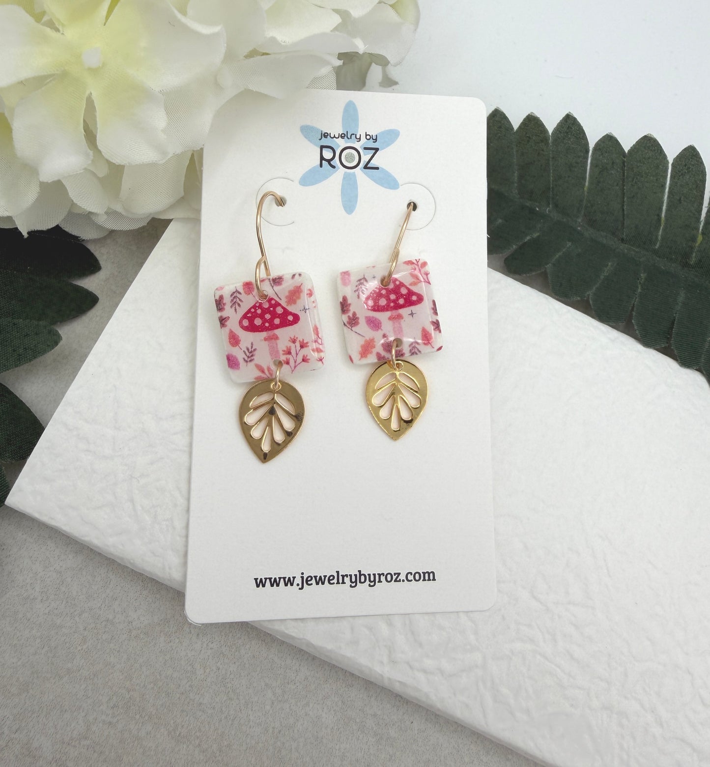 Earrings Made with White Polymer Clay with a Mushroom Pattern and Gold Plated Leaf Charms PCE-1064