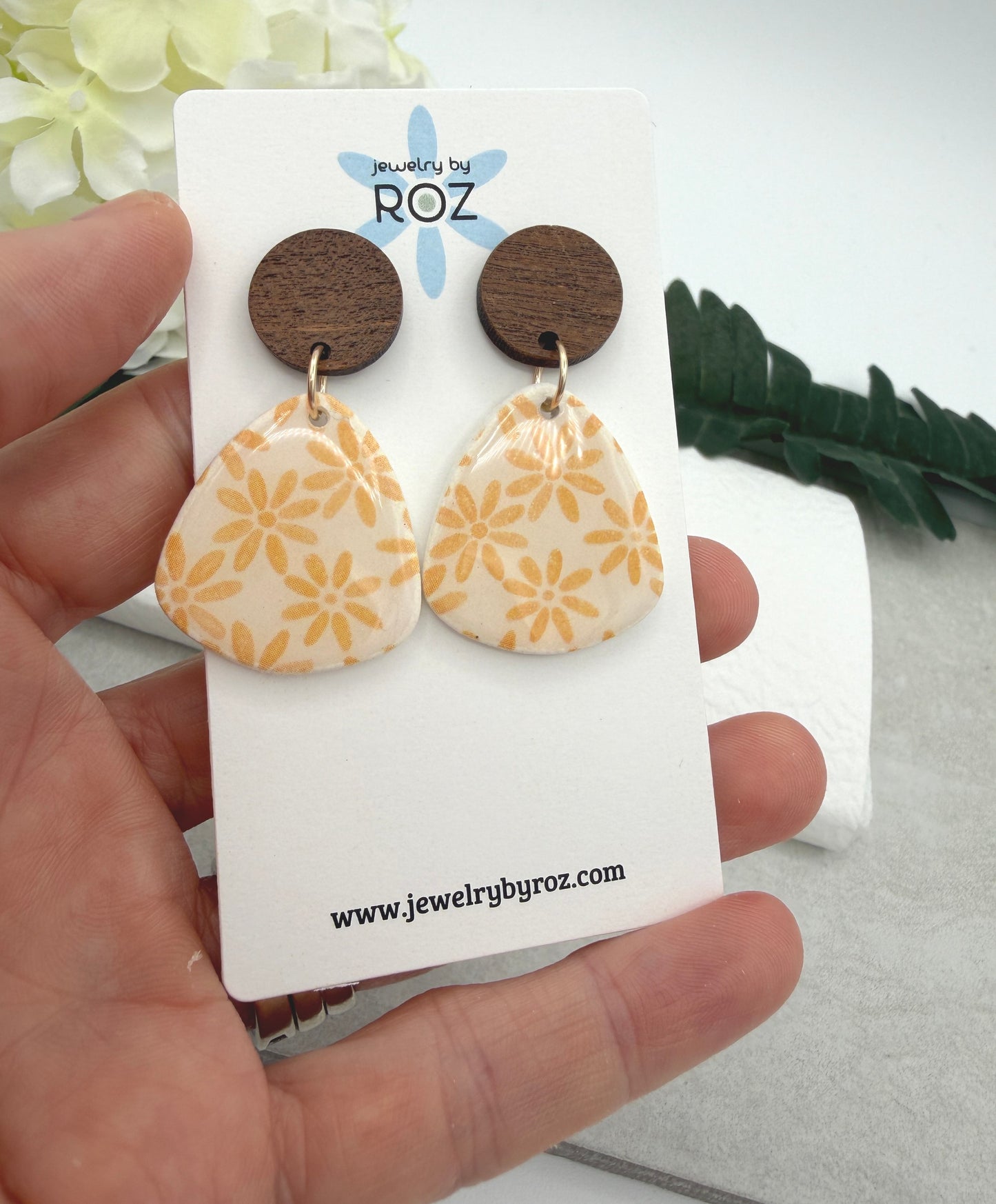 Earrings Made with White Polymer Clay Teardrops with a Yellow Flower Pattern and Wood Posts PCE-1067