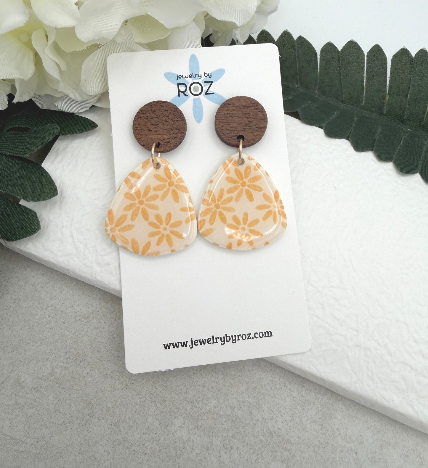 Earrings Made with White Polymer Clay Teardrops with a Yellow Flower Pattern and Wood Posts PCE-1067