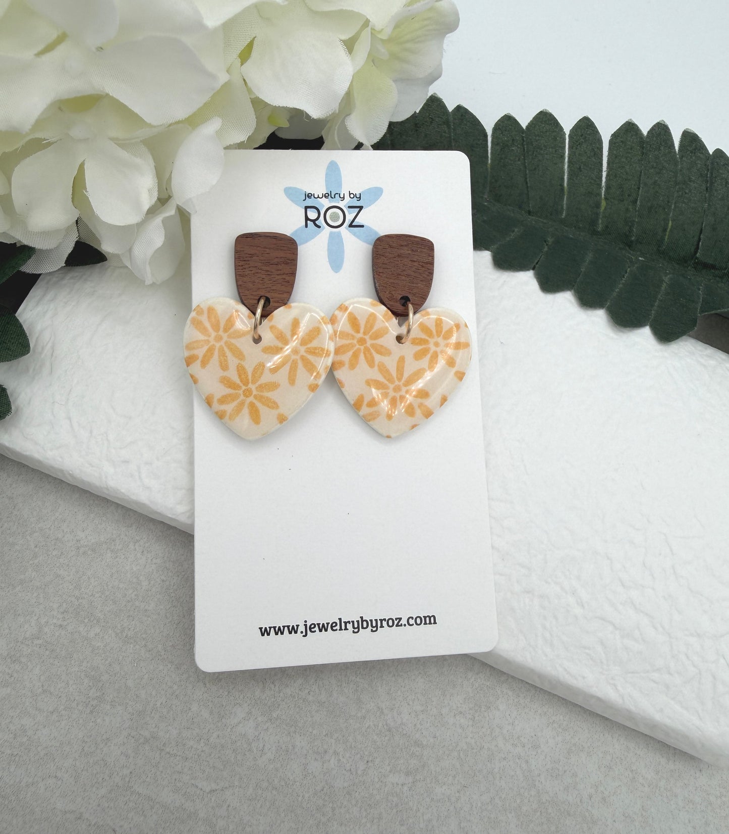 Earrings Made with White Polymer Clay Hearts with a Yellow Flower Pattern and Wood Posts PCE-1068