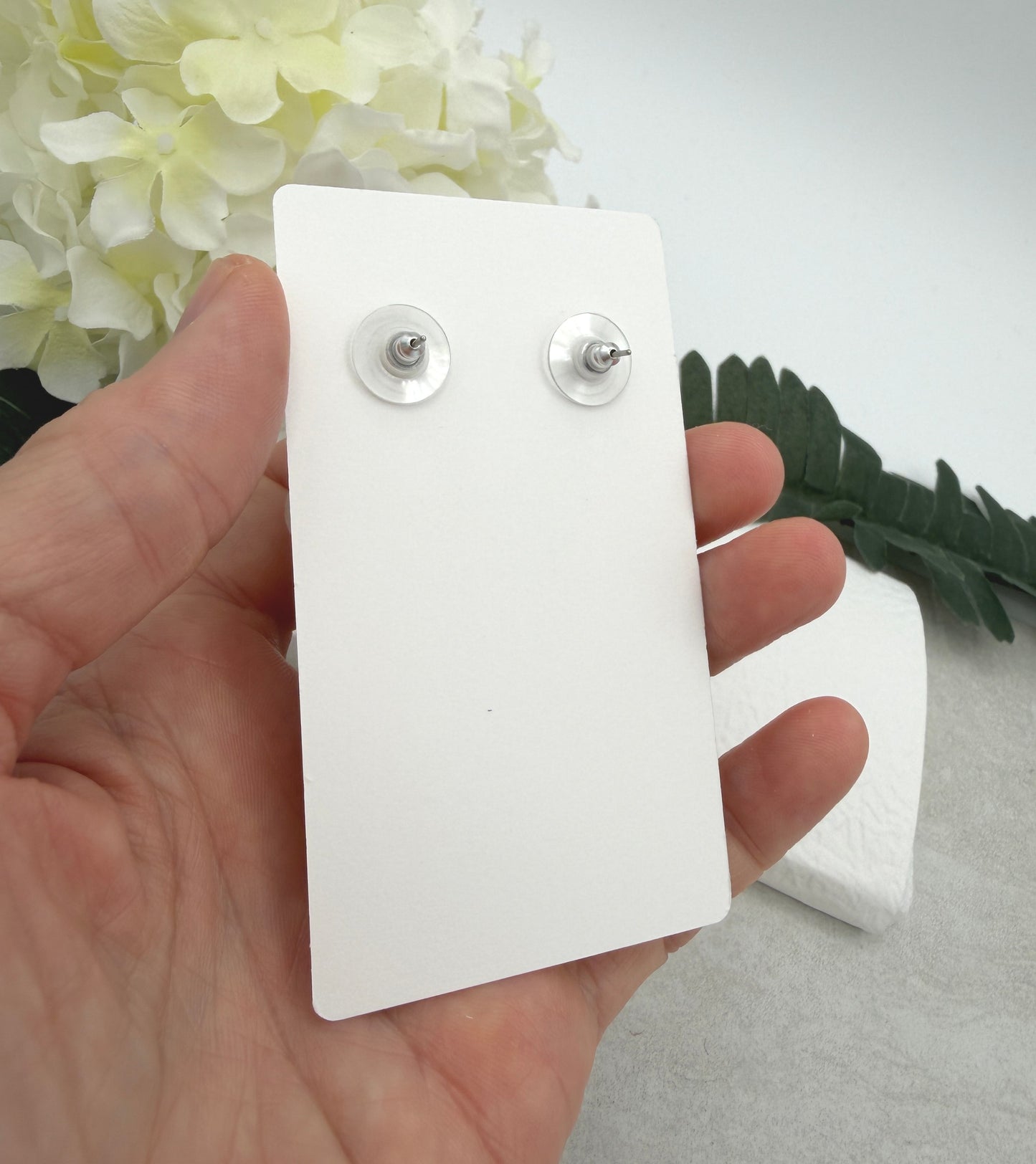 Earrings Made with White Polymer Clay Hearts with a Yellow Flower Pattern and Wood Posts PCE-1068
